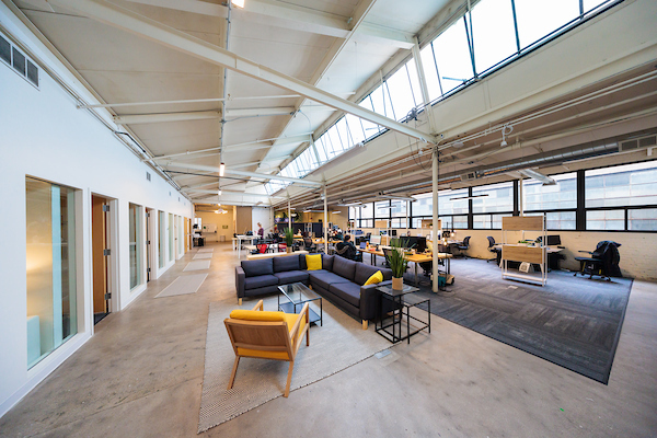 Sunlit coworking loft interior at Platform Coworking in Ravenswood, Chicago