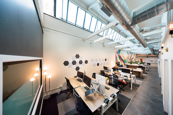 Open flex desk seating at Platform Coworking